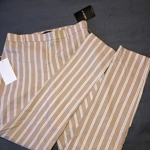 Ankle belted girl pants.